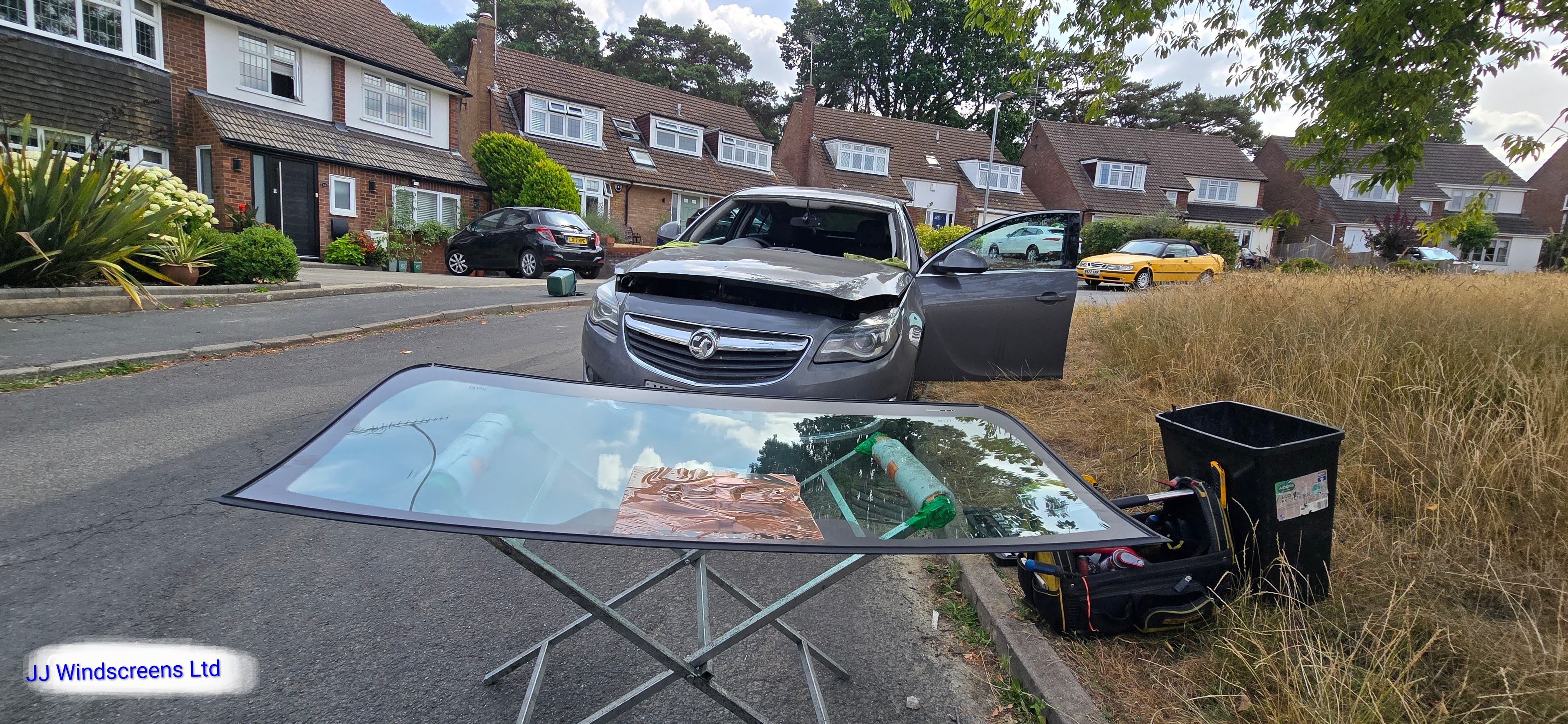 New windscreen on fitting table ready for installation on Vauxhall Insignia in Potters Bar EN6 by JJ Windscreens