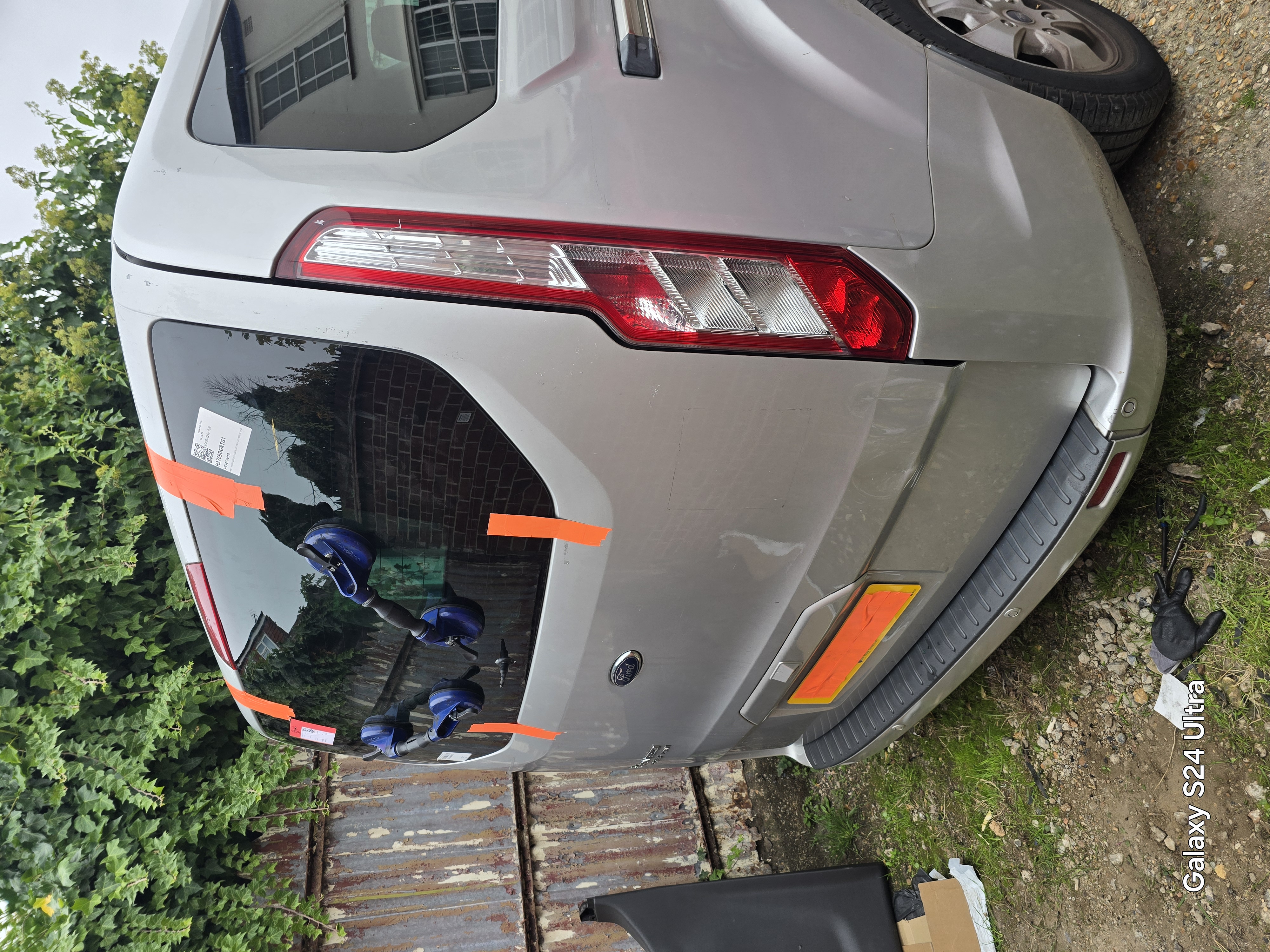Land Rover rear quarter glass replacement completed by JJ Windscreens in Walthamstow — new glass fitted and taped