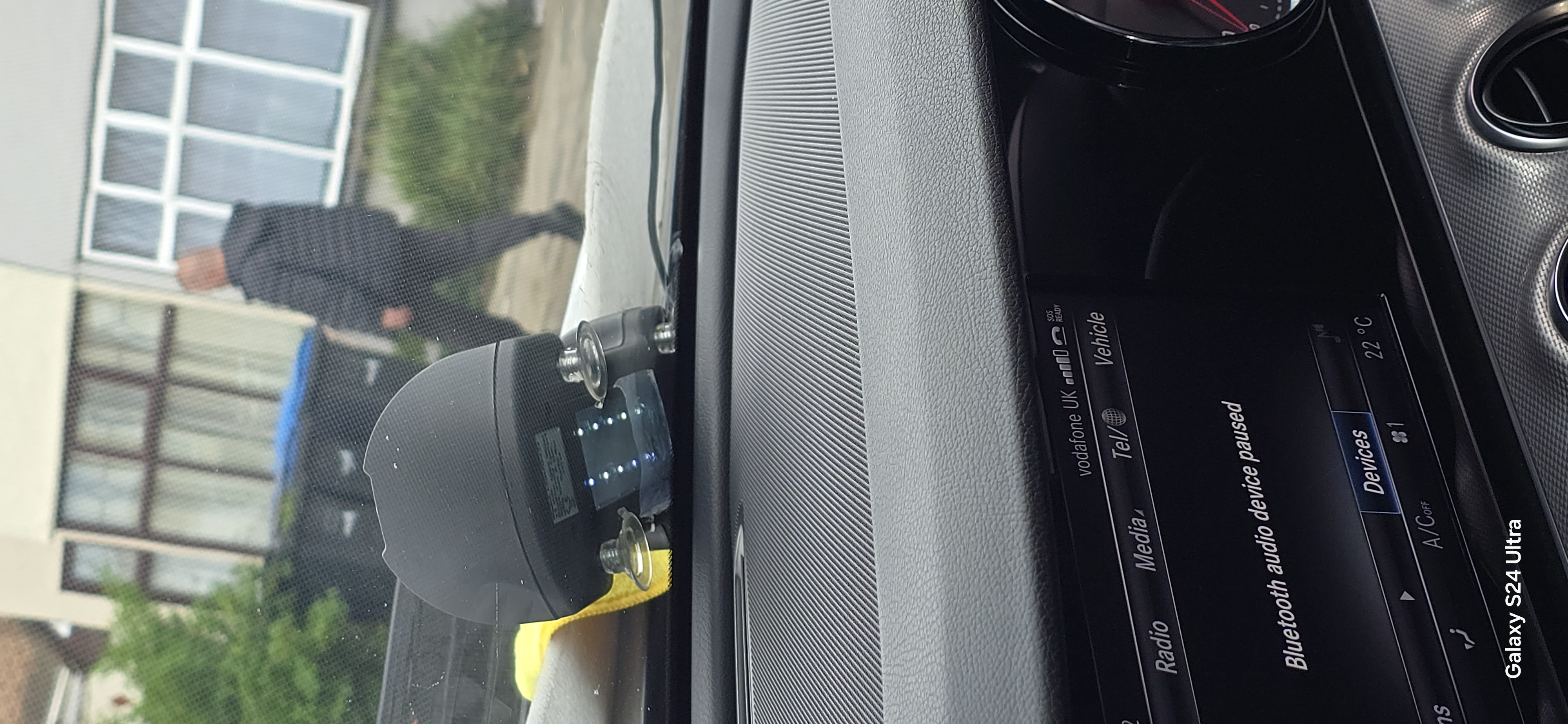 JJ Windscreens technician using suction repair tool on windscreen chip — Edmonton